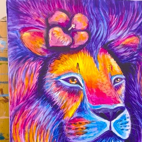 Bonus #3: the finished neon lion with a pink flower painted into the mane above one ear