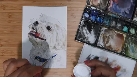 A watercolor portrait of a small white dog being painted