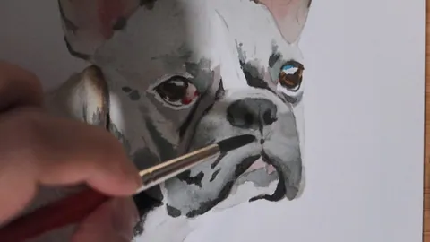 Building depth in a watercolor dog portrait with stacked layers of colour